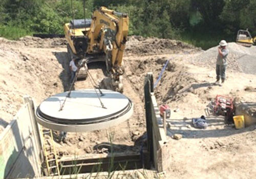 A construction crew is working on a construction site.