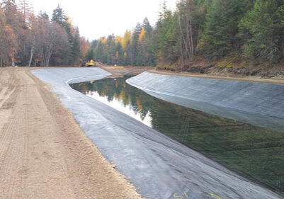 A river with a tarp in the middle of it.